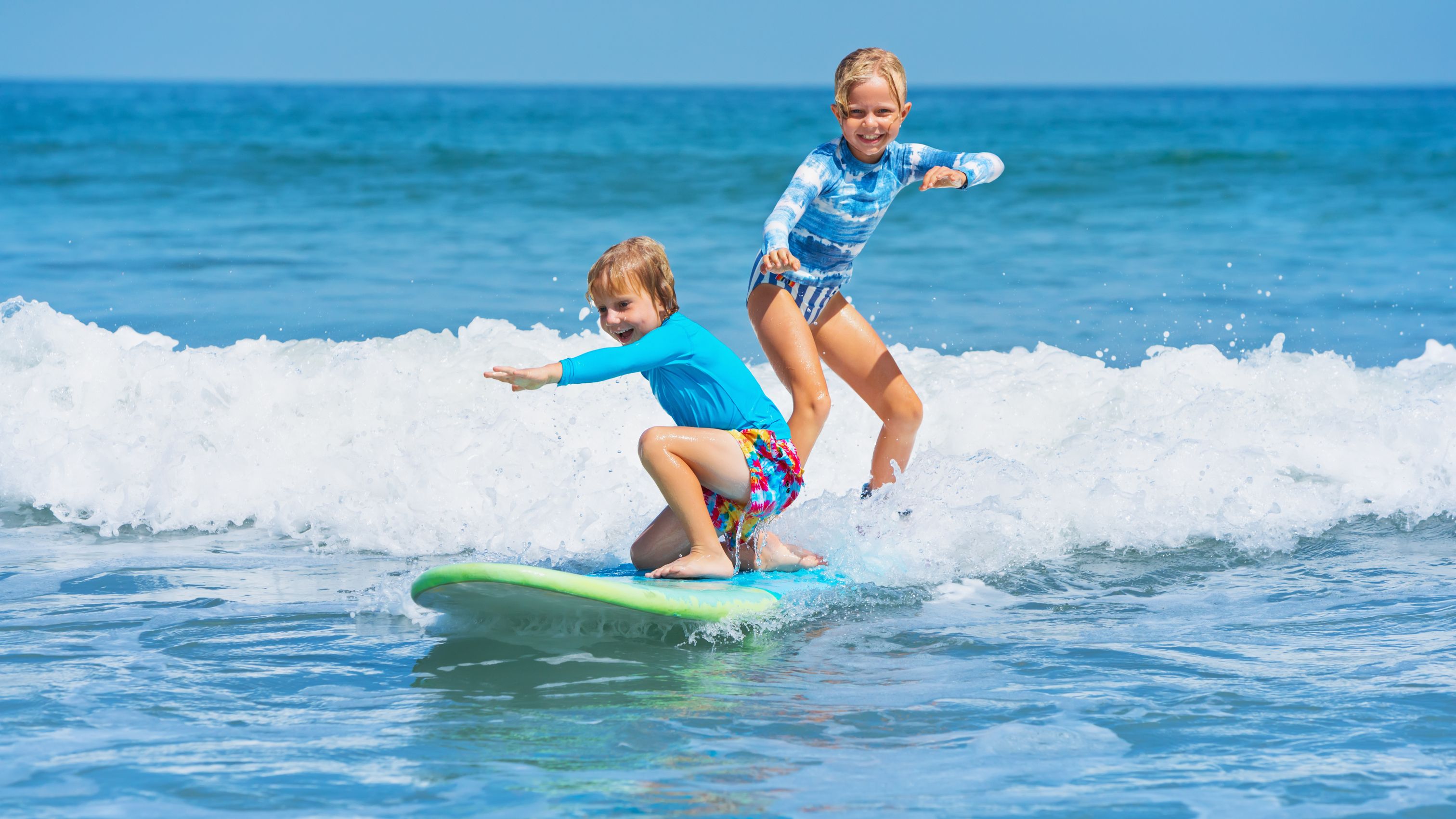 Family-friendly portugal. Children playing in the surf.jpeg