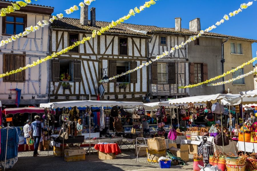 Market day in the medieval village of Eymet in Dordogne, France..jpg